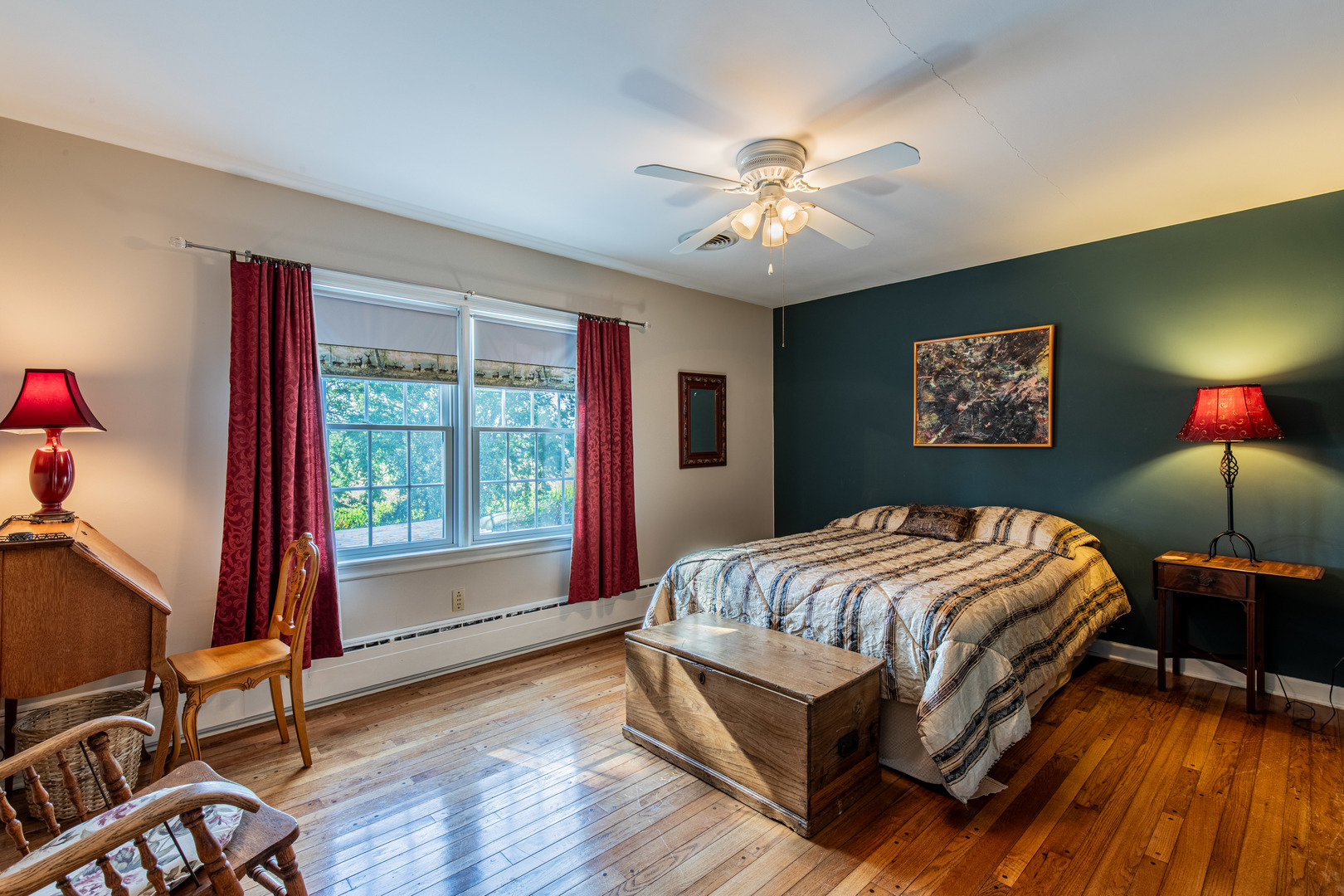 1840 South Main Street Princeton, IL 61356 - Photo 31 of 51 a bedroom with a bed and a chandelier