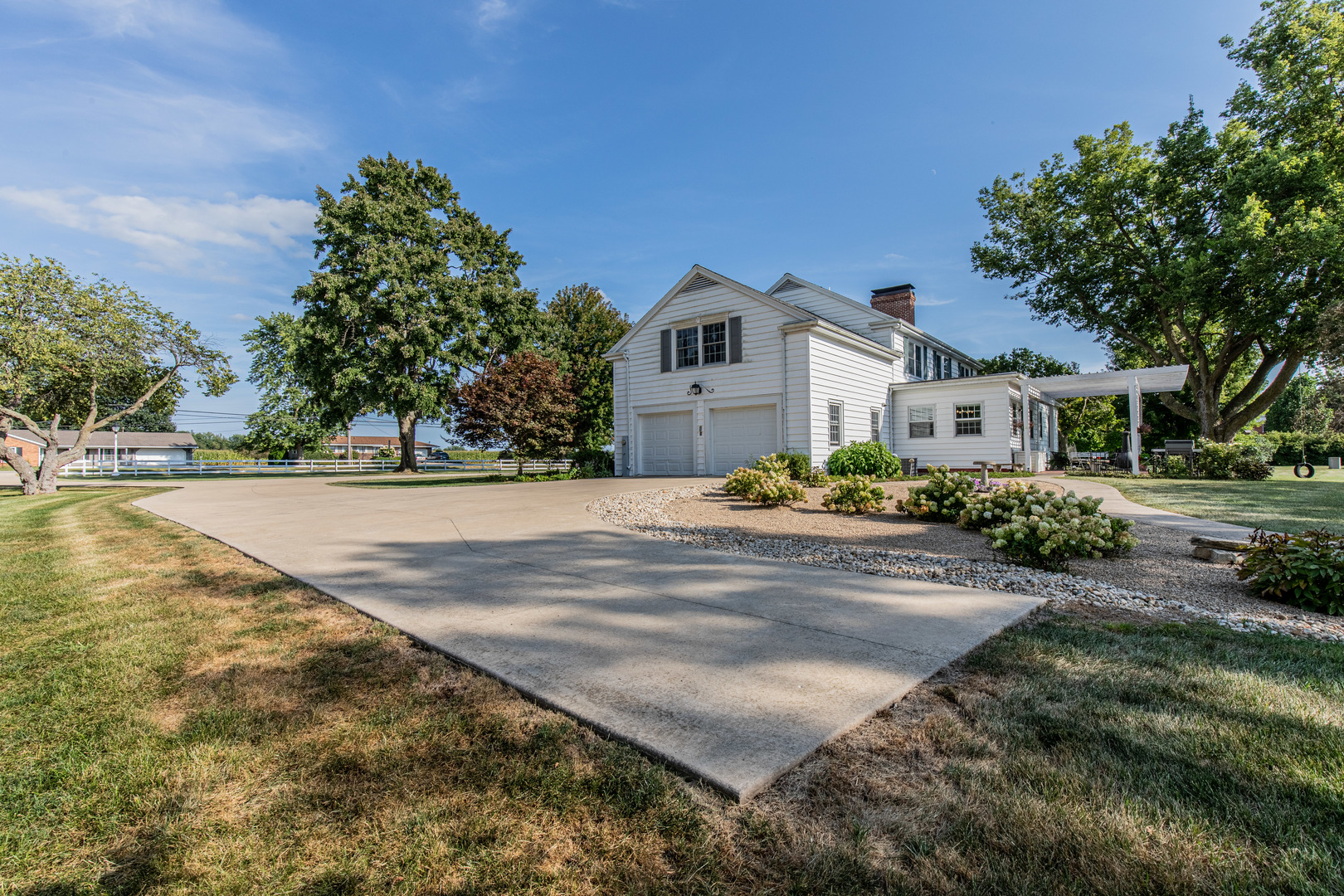 1840 South Main Street Princeton, IL 61356 - Photo 36 of 51 a front view of a house with a yard and trees