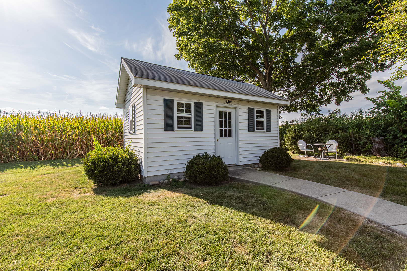 1840 South Main Street Princeton, IL 61356 - Photo 38 of 51 a backyard of a house with yard and outdoor seating