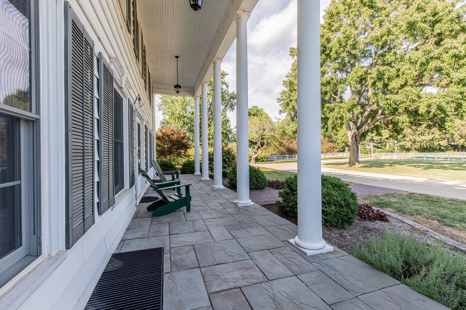 1840 South Main Street Princeton, IL 61356 - Photo 4 of 51 a bench is sitting in front of a building