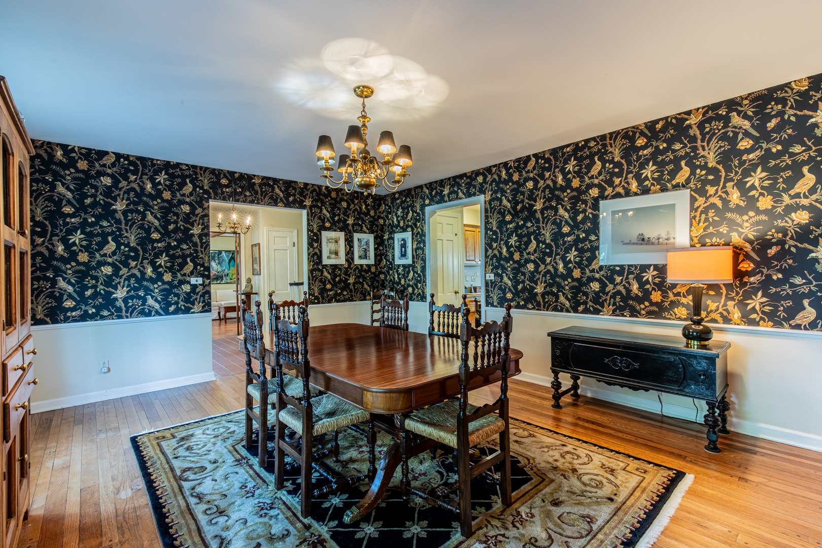 1840 South Main Street Princeton, IL 61356 - Photo 8 of 51 a living room with furniture and a chandelier