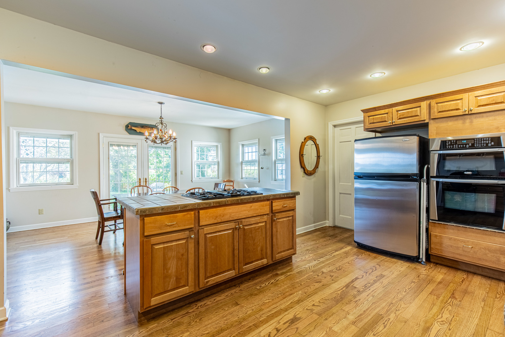 1840 South Main Street Princeton, IL 61356 - Photo 9 of 51 a kitchen with stainless steel appliances granite countertop a stove a sink and a refrigerator