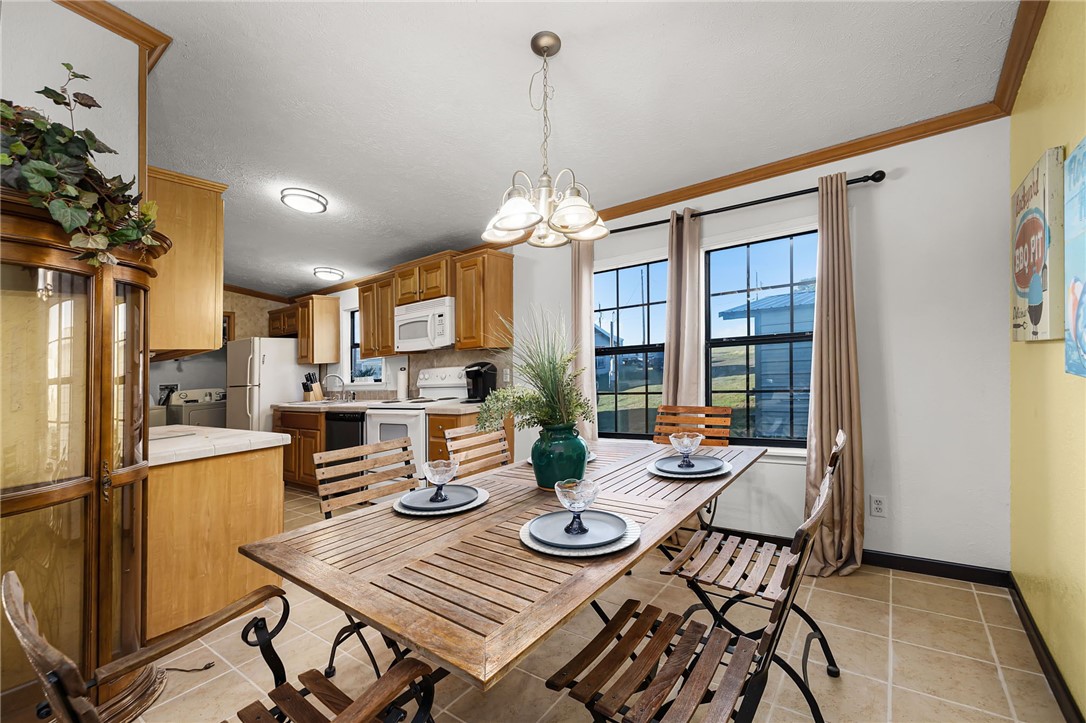 1761 Lcr 822 Groesbeck, TX 76642 - Photo 24 of 93 a view of a dining room with furniture window and wooden floor