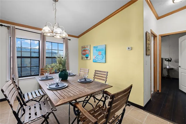 a bedroom with two beds and a tv