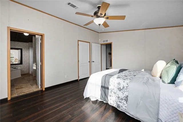 a view of a house with wooden deck