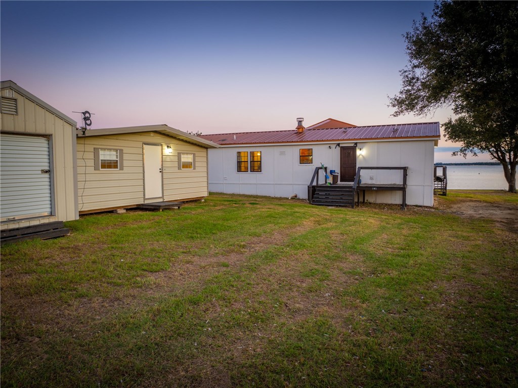 1761 Lcr 822 Groesbeck, TX 76642 - Photo 60 of 93 a view of a house with a yard and sitting area
