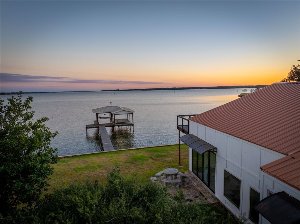 1761 Lcr 822 Groesbeck, TX 76642 - Photo 10 of 93 a view of a backyard with plants and outdoor seating