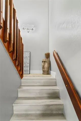 a view of a hallway with closet