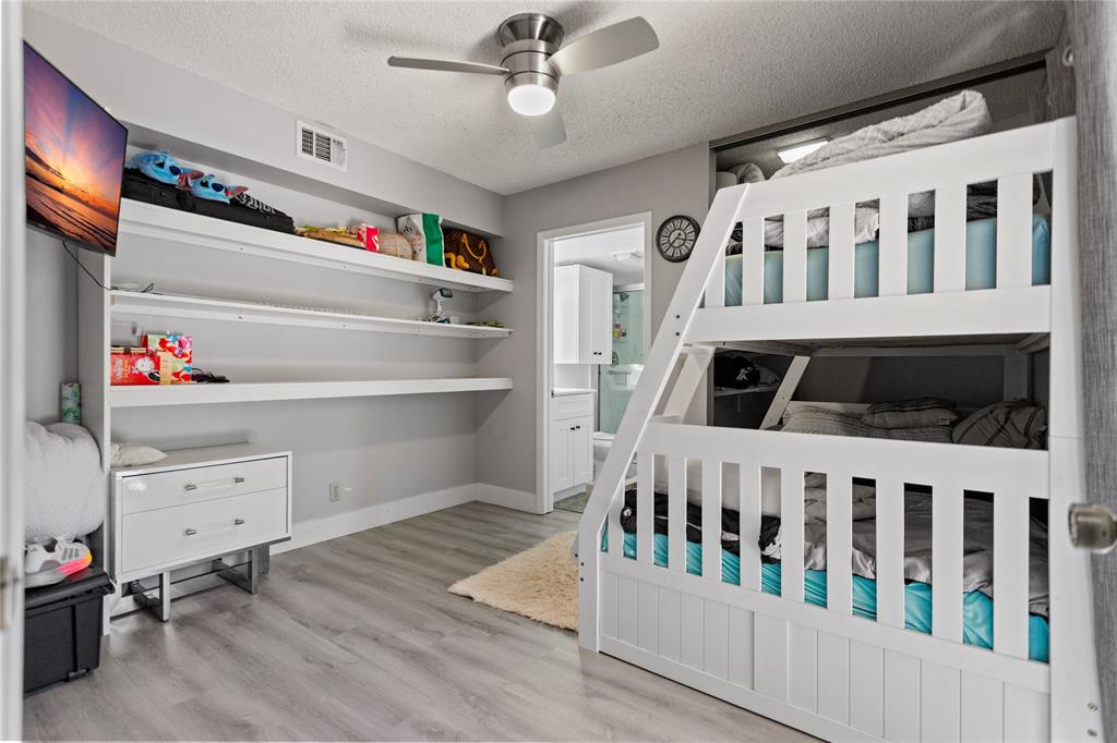 22940 Oxford Place, Unit C Boca Raton, FL 33433 - Photo 15 of 60 a view of an empty room with baby crib