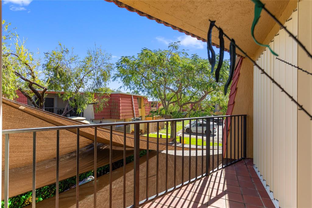 22940 Oxford Place, Unit C Boca Raton, FL 33433 - Photo 35 of 60 a view of a balcony