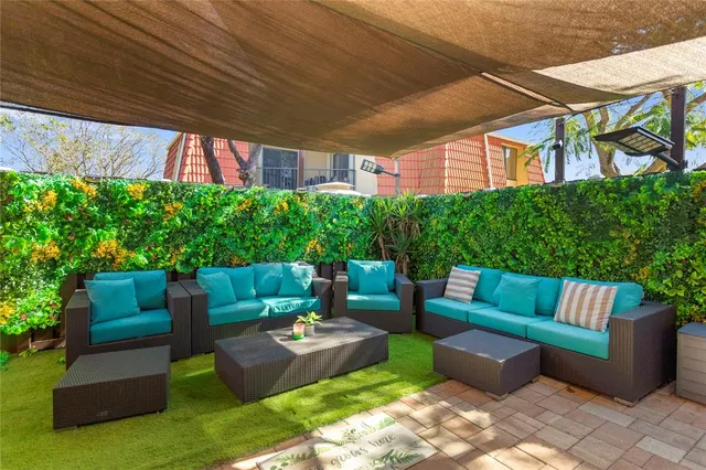 a outdoor living space with furniture and garden view