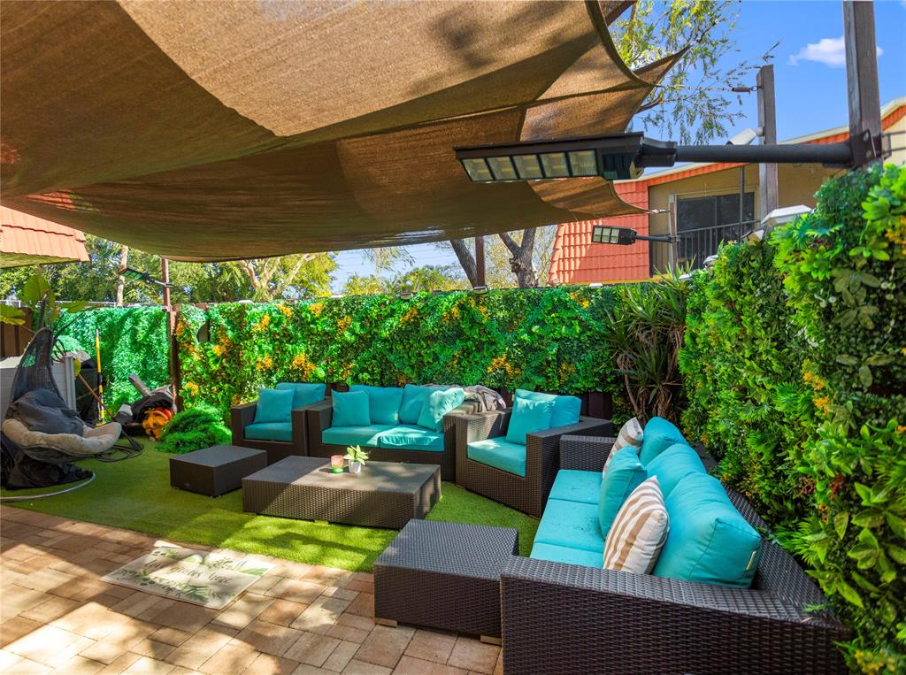 22940 Oxford Place, Unit C Boca Raton, FL 33433 - Photo 42 of 60 a view of a couches in patio of a house