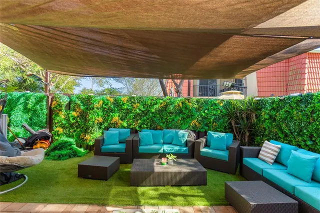 a backyard of a house with lots of green space