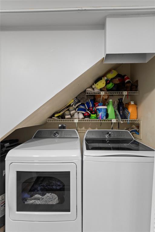 22940 Oxford Place, Unit C Boca Raton, FL 33433 - Photo 46 of 60 a utility room with dryer and washer