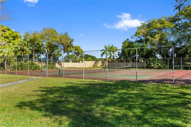 a view of a yard with furniture