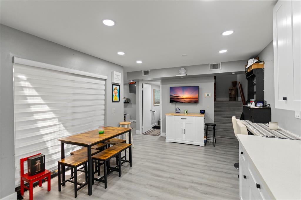 22940 Oxford Place, Unit C Boca Raton, FL 33433 - Photo 5 of 60 a living room with furniture and a flat screen tv