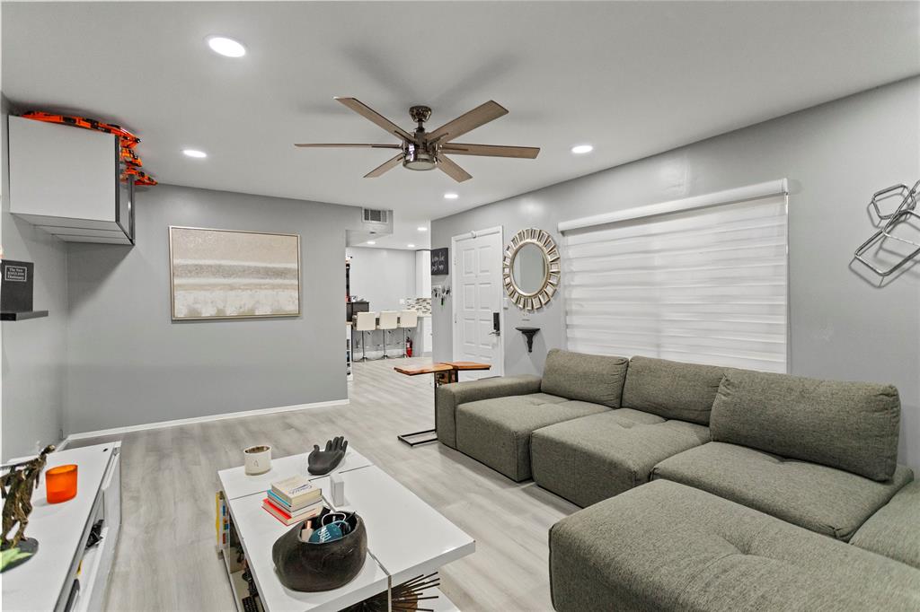 22940 Oxford Place, Unit C Boca Raton, FL 33433 - Photo 10 of 60 a living room with furniture and a window