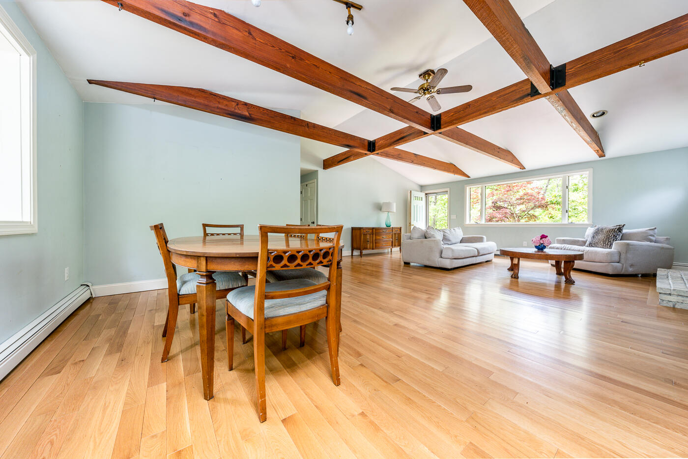 115 Pine Needle Road Wellfleet, MA 02667 - Photo 12 of 37 a dining room with furniture and wooden floor