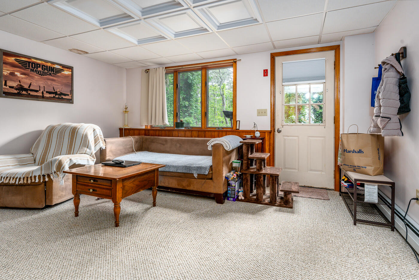 115 Pine Needle Road Wellfleet, MA 02667 - Photo 27 of 37 a living room with furniture and a flat screen tv