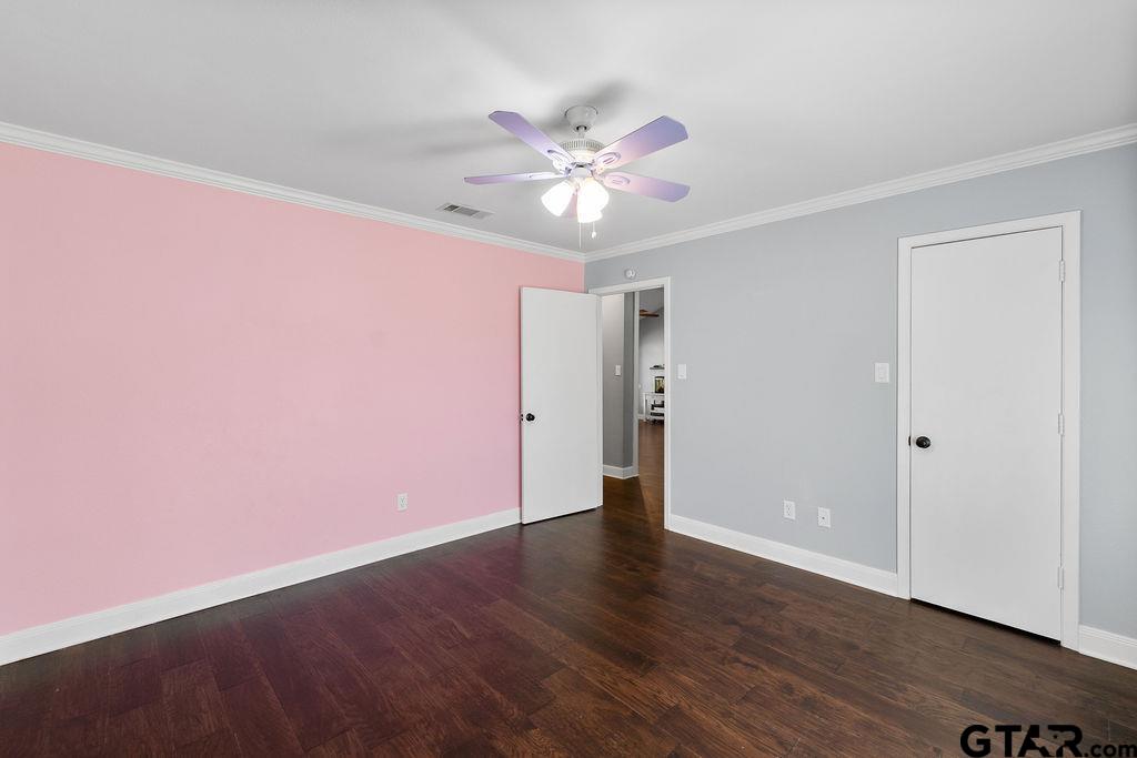 1102 Lilly Lane Bullard, TX 75757 - Photo 20 of 48 a view of an empty room with wooden floor