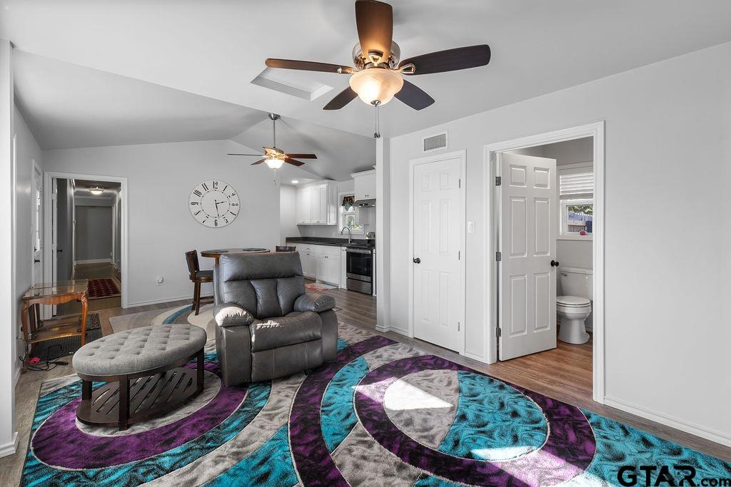 1102 Lilly Lane Bullard, TX 75757 - Photo 27 of 48 a living room with furniture and a rug