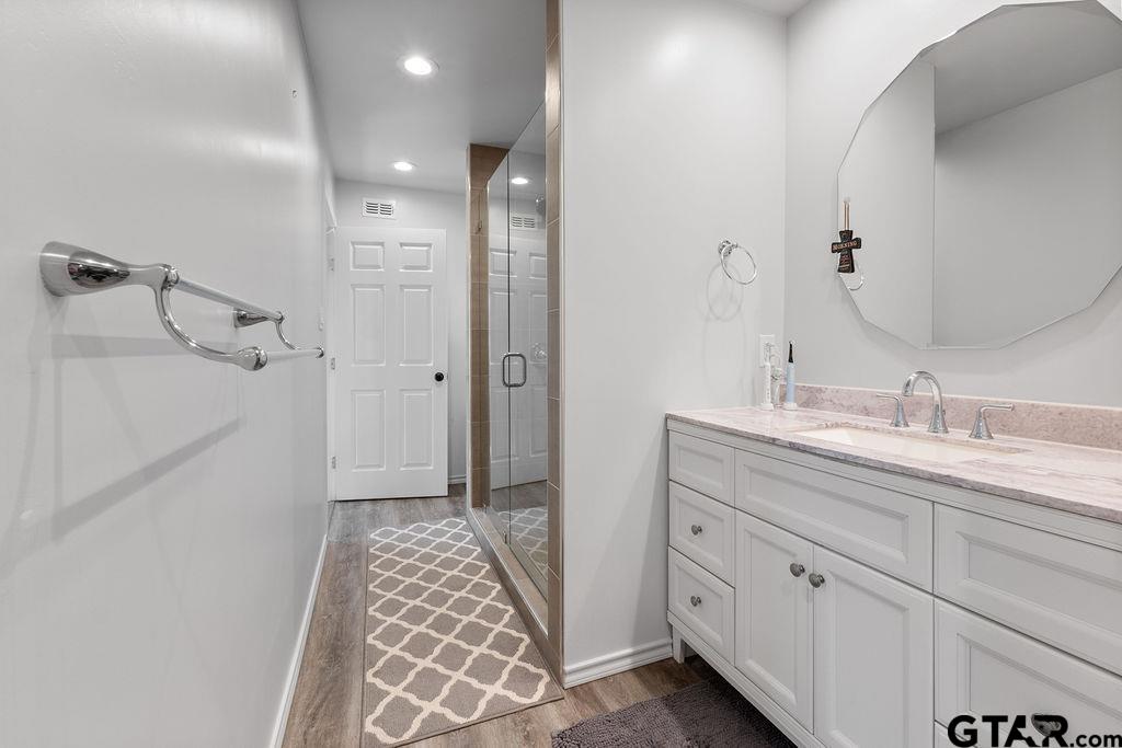 1102 Lilly Lane Bullard, TX 75757 - Photo 33 of 48 a bathroom with a double vanity sink mirror and double