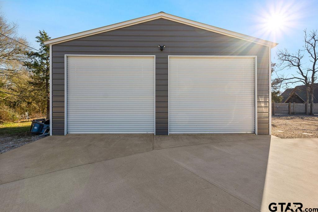 1102 Lilly Lane Bullard, TX 75757 - Photo 39 of 48 a front view of a house with a yard