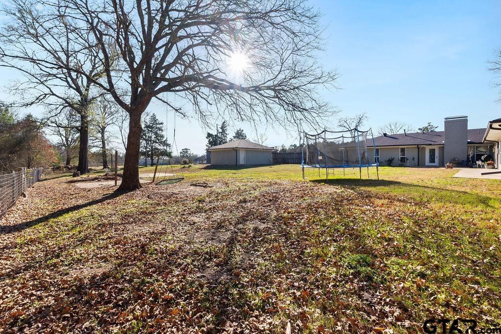 1102 Lilly Lane Bullard, TX 75757 - Photo 45 of 48 a view of a swimming pool with an outdoor seating