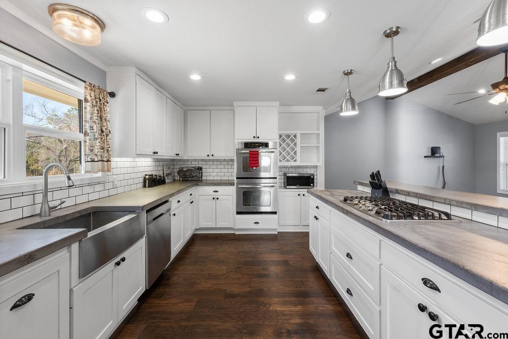 1102 Lilly Lane Bullard, TX 75757 - Photo 5 of 48 a large kitchen with stainless steel appliances lots of counter space sink and a window