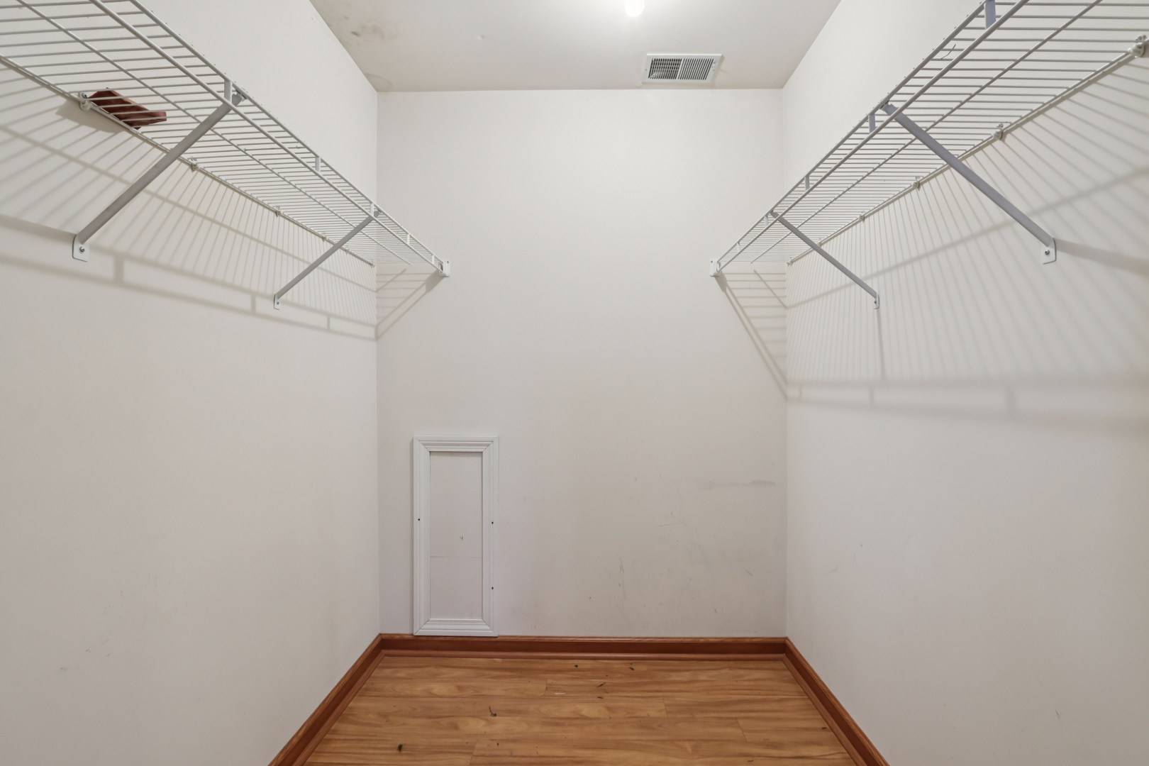 655 Waverly Drive, Unit C Elgin, IL 60120 - Photo 14 of 21 a view of a room with racks on the wall