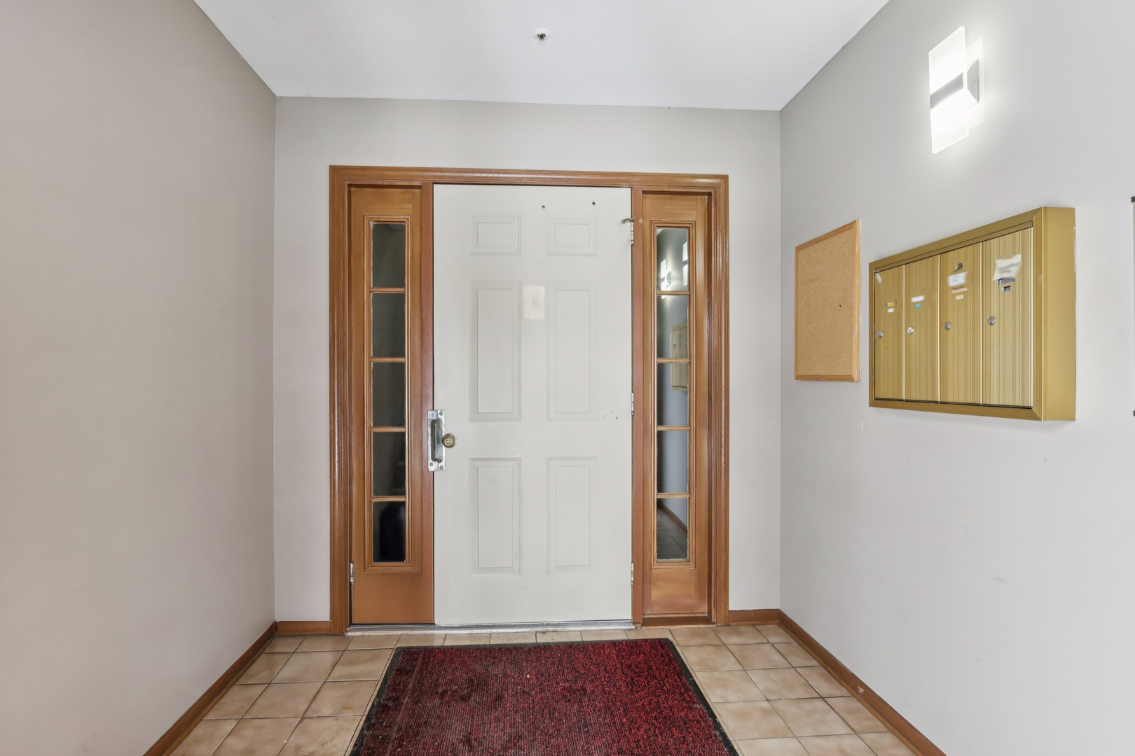 655 Waverly Drive, Unit C Elgin, IL 60120 - Photo 4 of 21 a view of front door with wooden floor