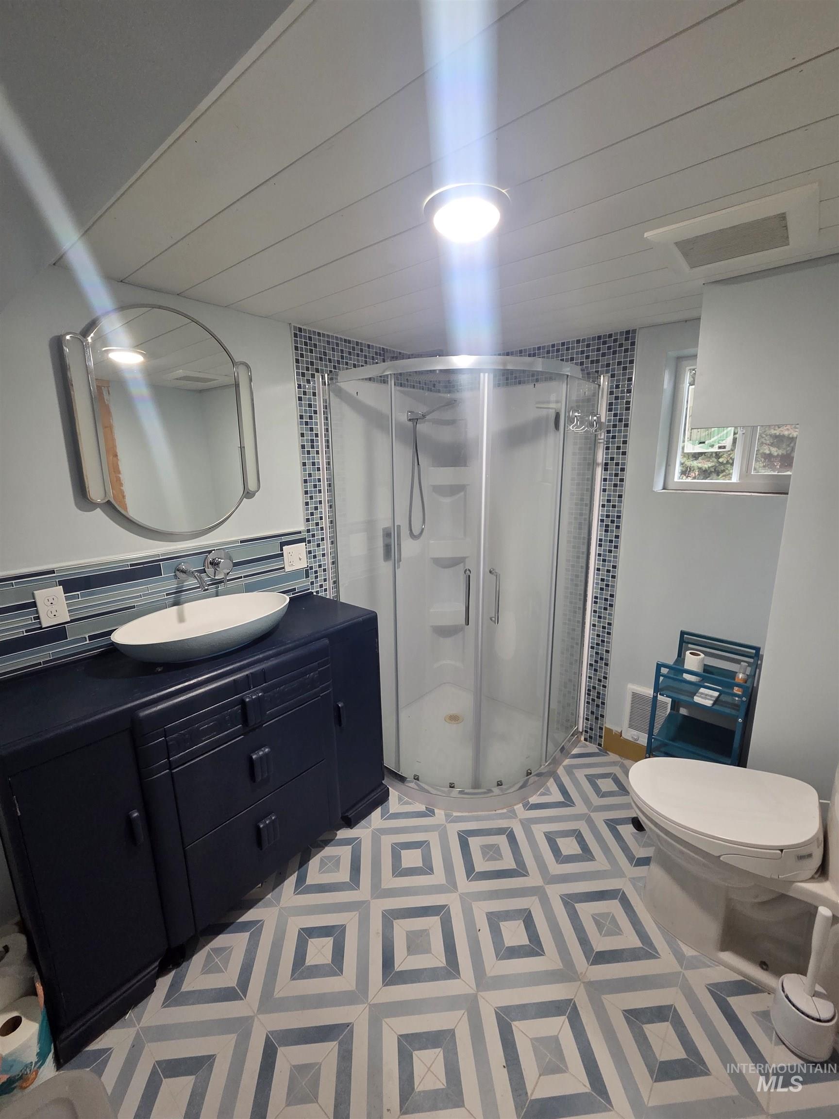 870 Dutch Flat Road Pomeroy, WA 99347 - Photo 24 of 33 Bathroom featuring vanity and a shower stall