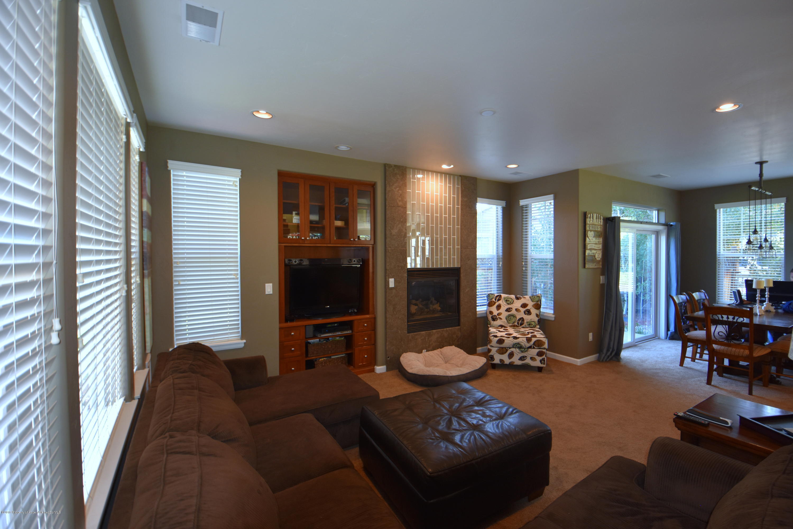 118 Carson Court New Castle, CO 81647 - Photo 12 of 26 a living room with furniture and a large window