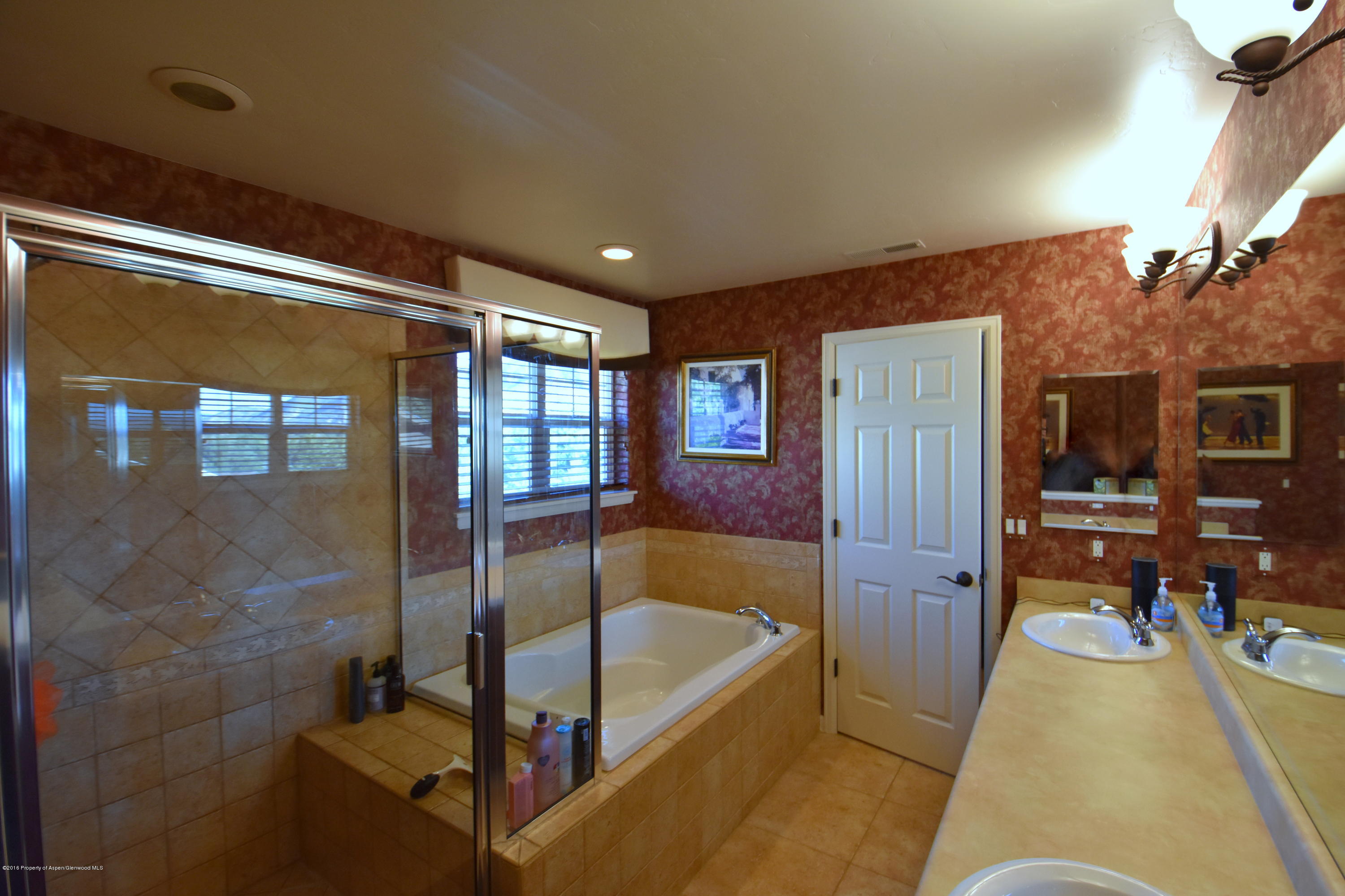 118 Carson Court New Castle, CO 81647 - Photo 20 of 26 a bathroom with a tub and shower