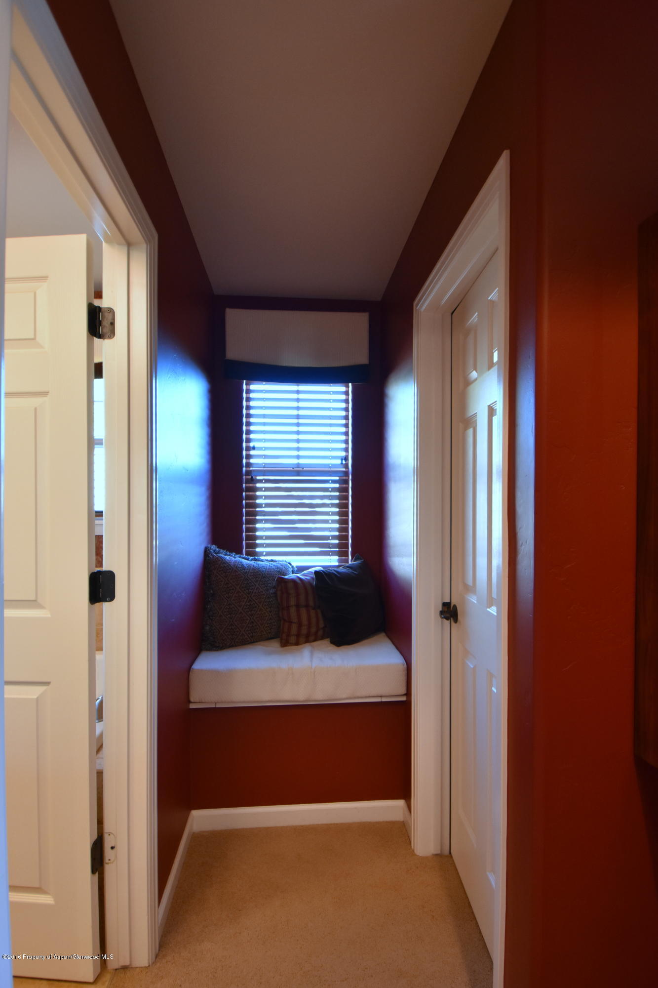 118 Carson Court New Castle, CO 81647 - Photo 21 of 26 a bedroom with a bed and a window