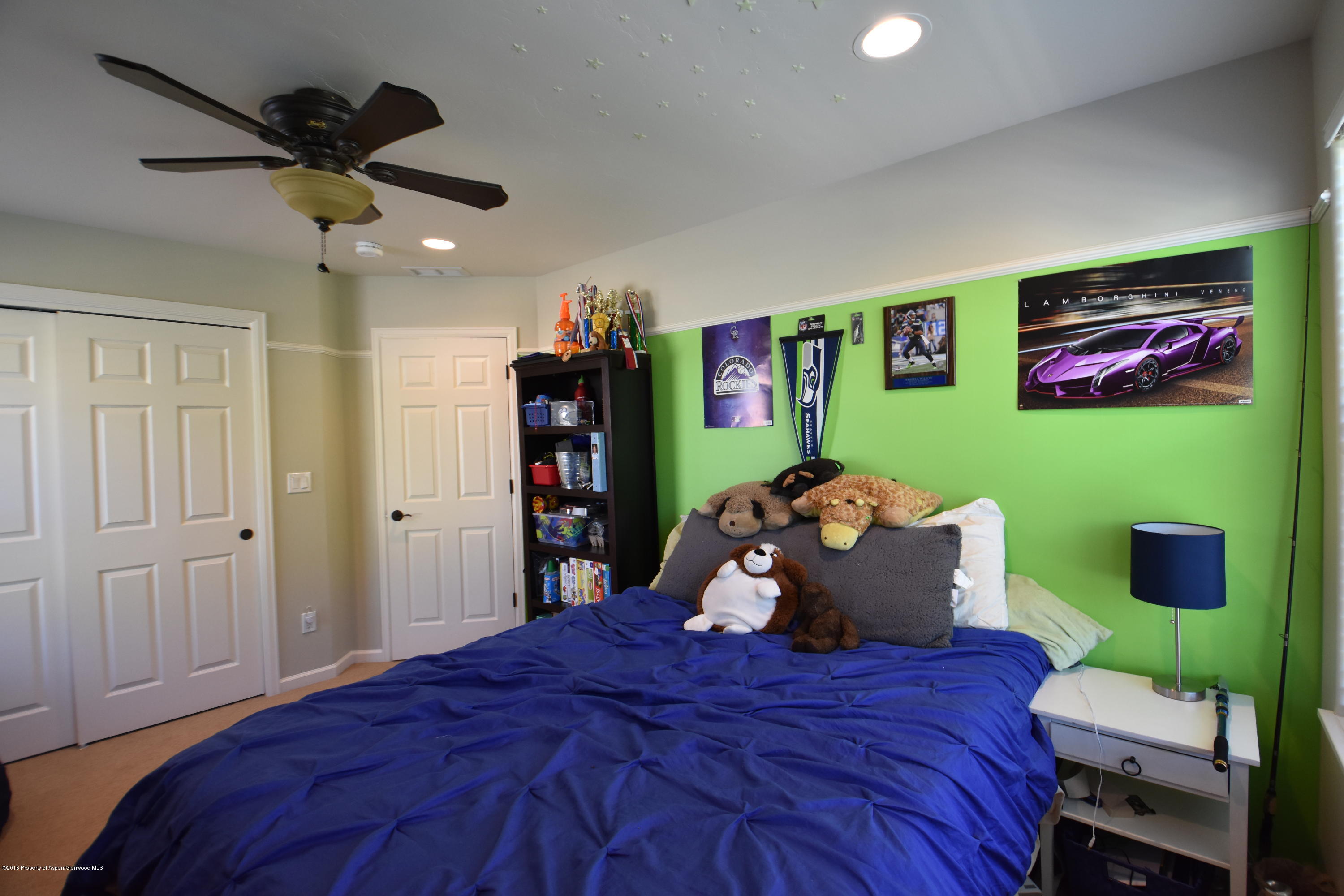 118 Carson Court New Castle, CO 81647 - Photo 23 of 26 a bed room with a bed and a window