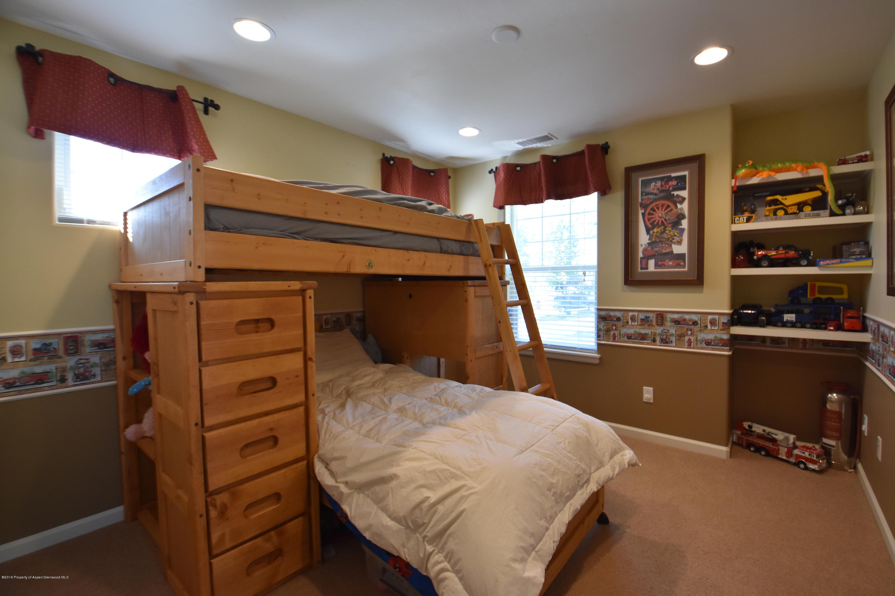 118 Carson Court New Castle, CO 81647 - Photo 24 of 26 a bedroom with a bed and furniture