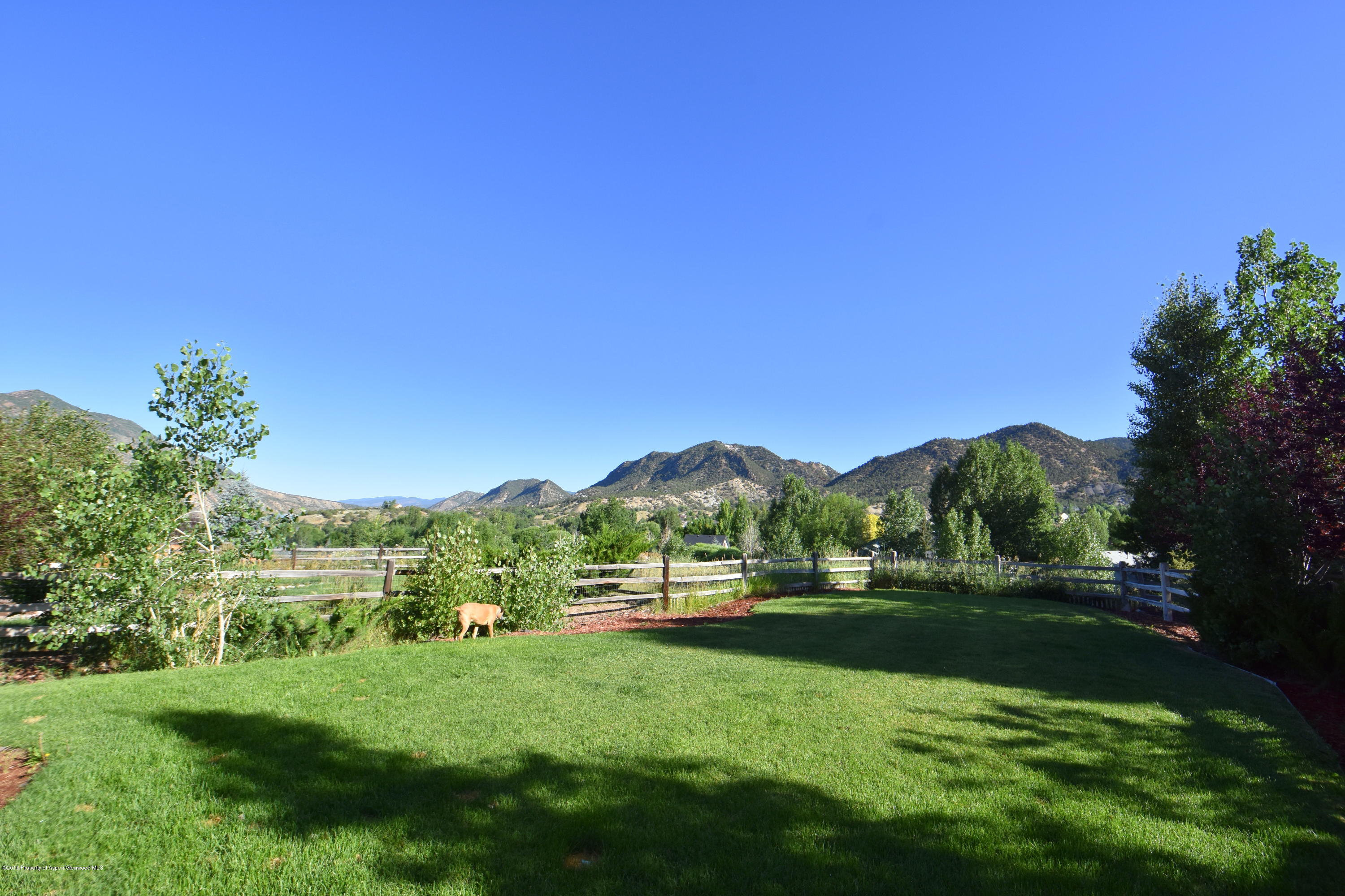 118 Carson Court New Castle, CO 81647 - Photo 5 of 26 a view of a city with lush green forest