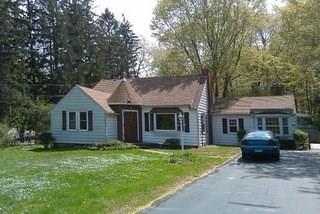42 Summit Road Prospect, CT 06712 - Photo 1 of 1 a front view of house with yard and green space