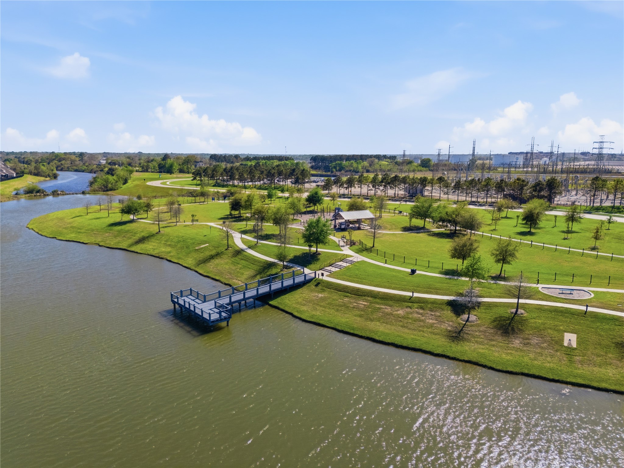 416 Bartlett Street Webster, TX 77598 - Photo 46 of 49 Lady Ann Lake with fishing pier, walking paths, and green park space