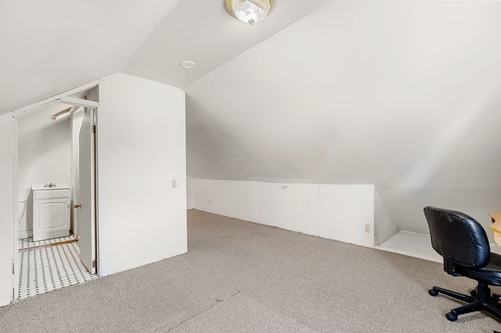 29 Harding Avenue Everett, MA 02149 - Photo 15 of 32 a view of a livingroom with a bench