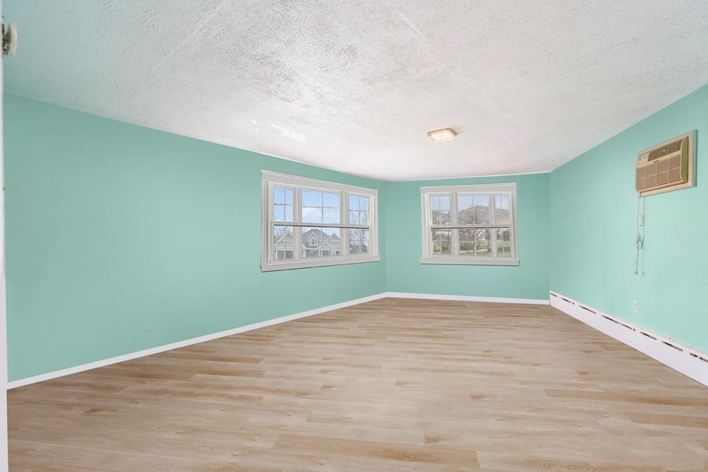 29 Harding Avenue Everett, MA 02149 - Photo 22 of 32 an empty room with windows