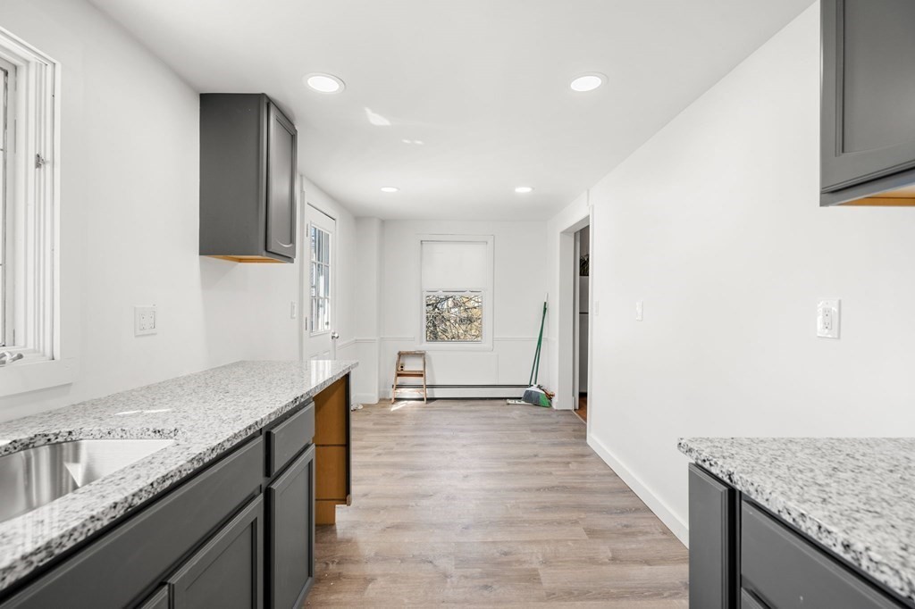 29 Harding Avenue Everett, MA 02149 - Photo 6 of 32 a view of a kitchen cabinets a sink and dishwasher in a kitchen