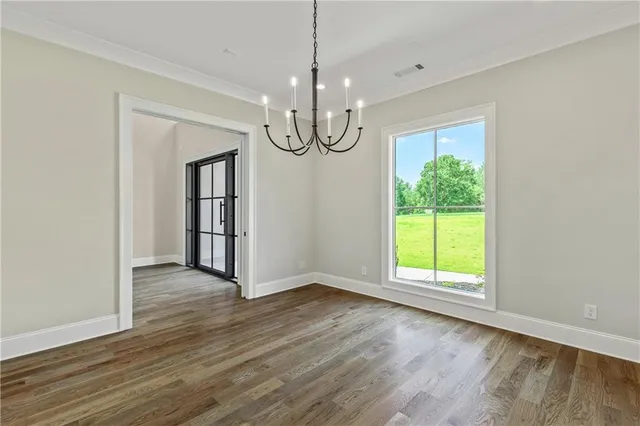 a white stove top oven sitting inside of a kitchen