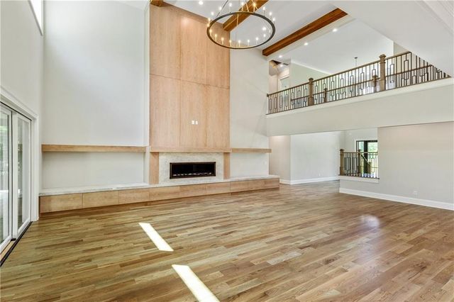 a kitchen with stainless steel appliances granite countertop a sink and cabinets