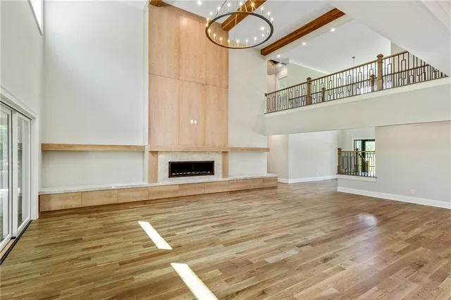 a kitchen with stainless steel appliances granite countertop a sink and cabinets