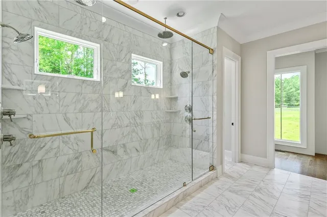 a view of a house with a yard and a garden