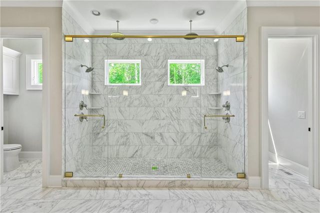 an aerial view of a house with swimming pool outdoor seating and yard