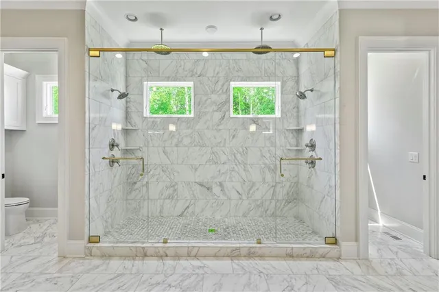 an aerial view of a house with swimming pool outdoor seating and yard