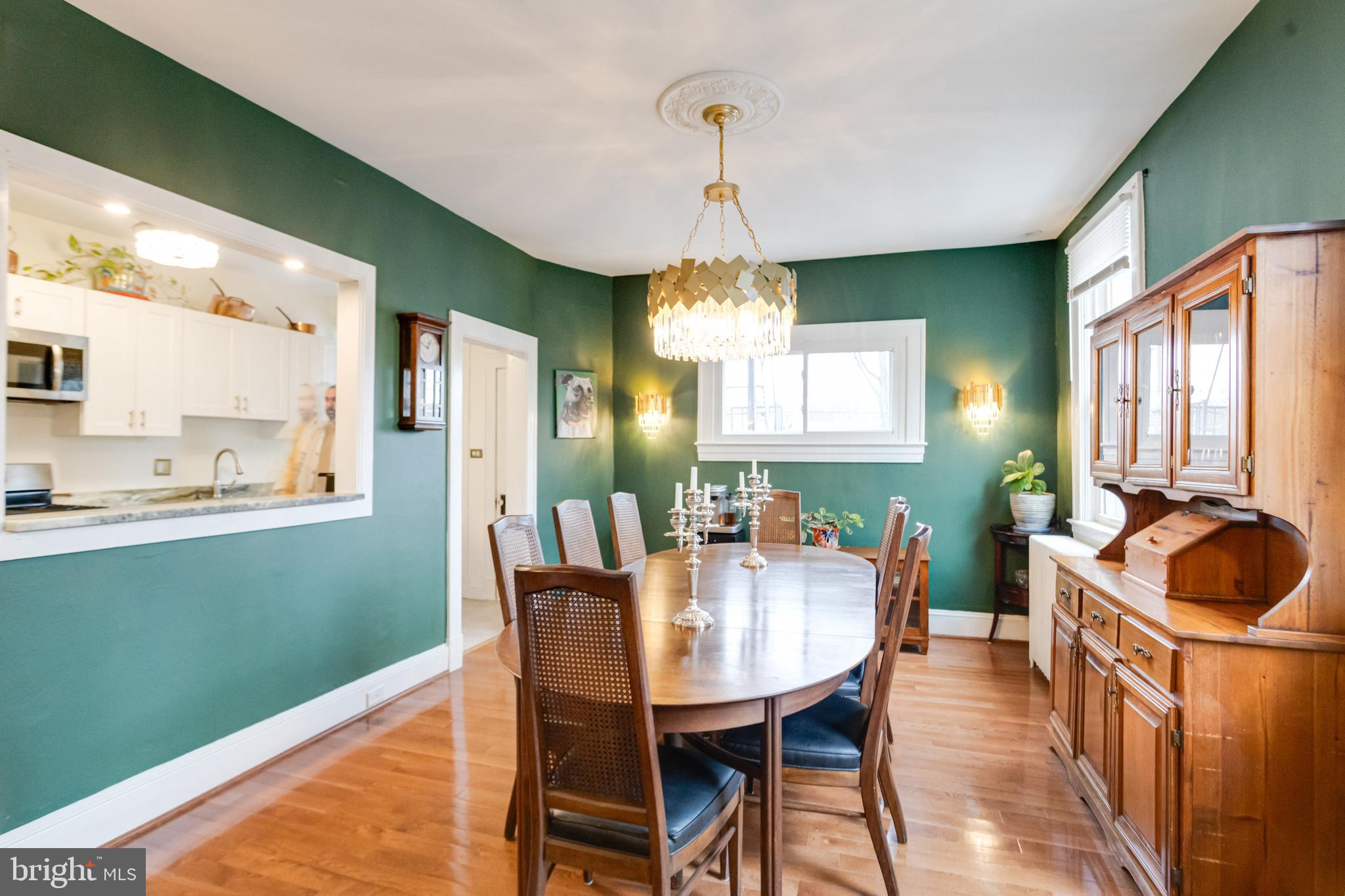 3901 Keswick Road Baltimore, MD 21211 - Photo 22 of 87 a dining room with furniture and window